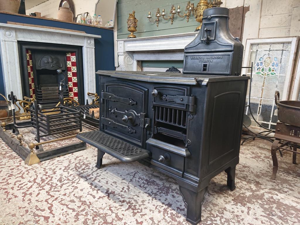 <p>Original cast iron range cooker from Webber and Saunders Tiverton.</p><p>76 cm wide x 92 cm high. Ornamental use only.</p>